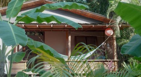 Tropical bungalow terrace at Luz de Luna hotel in Santa Teresa Costa Rica with lush jungle surroundings